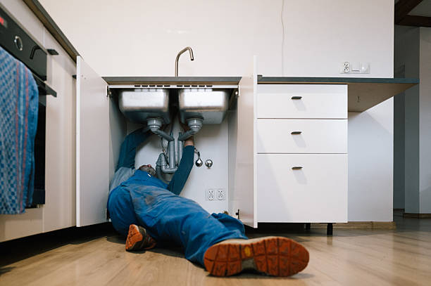 Professional Emergency Plumber technician working in Waldo, WI